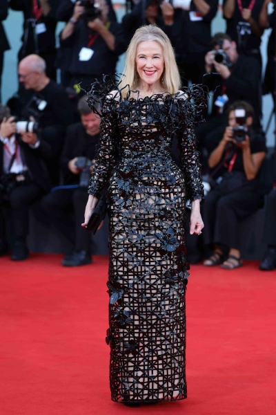 Catherine O'Hara attended the 'Beetlejuice Beetlejuice' premiere at the 2024 Venice Film Festival in a Moira Rose-coded gown. See her look that went full crowening, here.