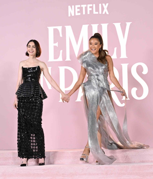 Lily Collins wore a peplum gown with her chic bob on the red carpet at the season premiere of 'Emily in Paris' season 4. See her full look, here.