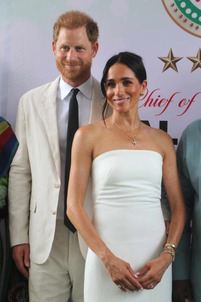 Meghan Markle arrived in Colombia with Prince Harry in a navy-blue power suit perfect for summer. See the easy, breezy look, here.