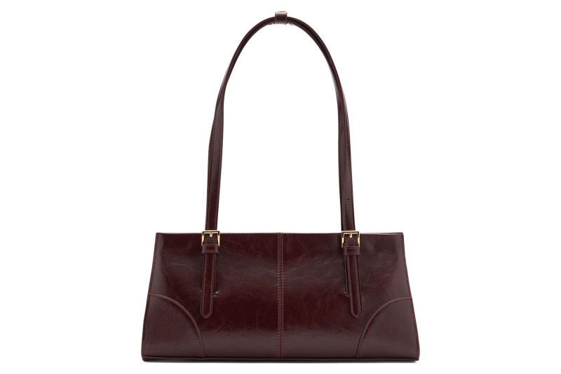 A fashion editor is shopping for oxblood and burgundy bags after seeing Coach’s spring 2025 runway show for New York Fashion Week. Shop Coach’s Brooklyn Shoulder Bag, Tabby, and more in the fall color trend.