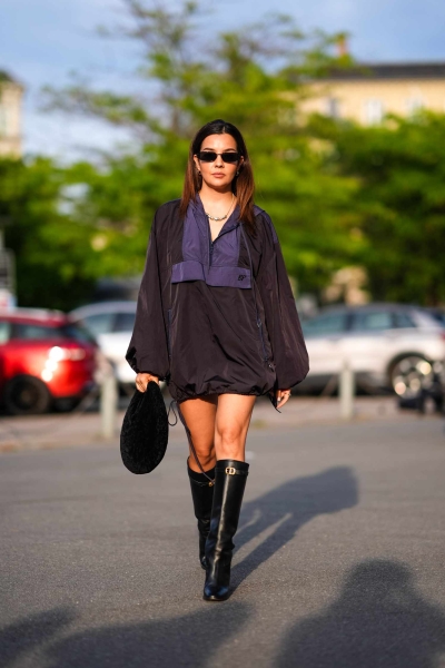 A pair of knee-high boots is a staple piece in our fall wardrobes. So, if you're looking to update them this season, here are 10 outfit ideas to try.