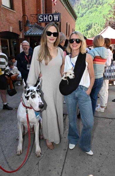 Angelina Jolie touched down at the Telluride Film Festival in Colorado wearing a greige sweater dress. See her full look, here.