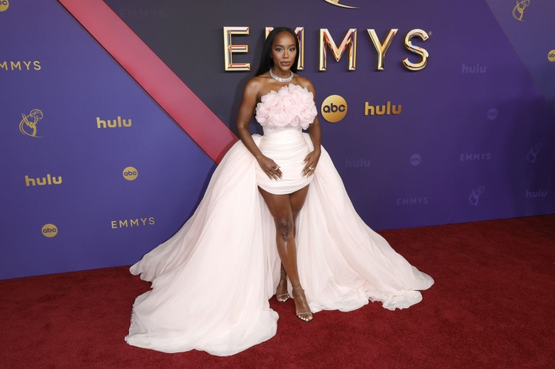 Celebrities are opting for pink tones at this year's Emmy Awards show, turning the soft shade into bold statements.