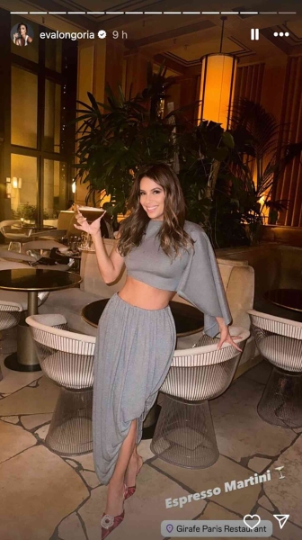 Eva Longoria shared a selfie from her night out that featured her in a gray crop top and bubble skirt set. See her look, here.