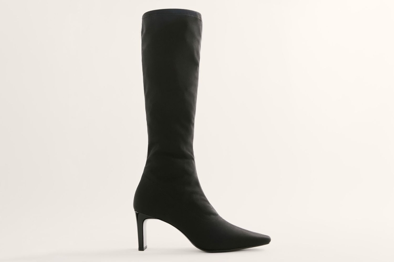 Eva Mendes wore knee-high black boots with a leopard print dress. The sexy fall shoes have been worn by Taylor Swift and Amal Clooney. Shop similar styles from Vivaia, Vagabond, Aerosoles, and more, starting at $50.