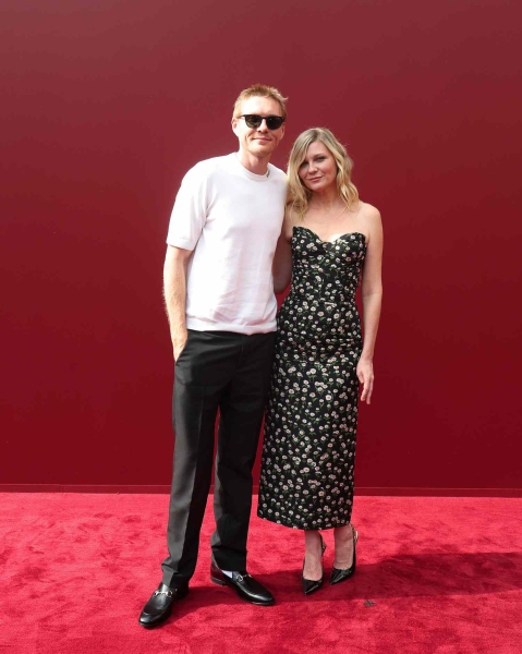 Kirsten Dunst brought her brother Christian to the Gucci fashion show during Milan Fashion Week. See the sweet sibling moment, here.