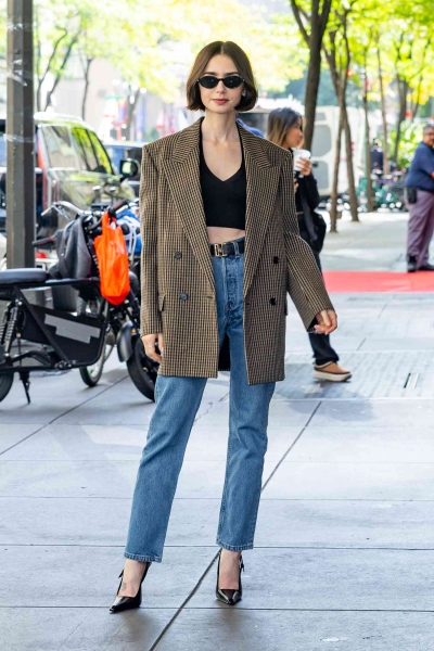 Lily Collins's style continues to be chic and timeless as she wears three classic outfits on another day of her 'Emily in Paris' press tour—and her blazers are the stars of the show.