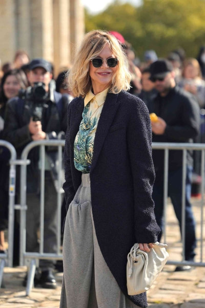 Meg Ryan made an appearance at Loewe's SS25 show at Paris Fashion Week wearing an ultra cozy autumnal look that absolutely screams Meg Ryan Fall.