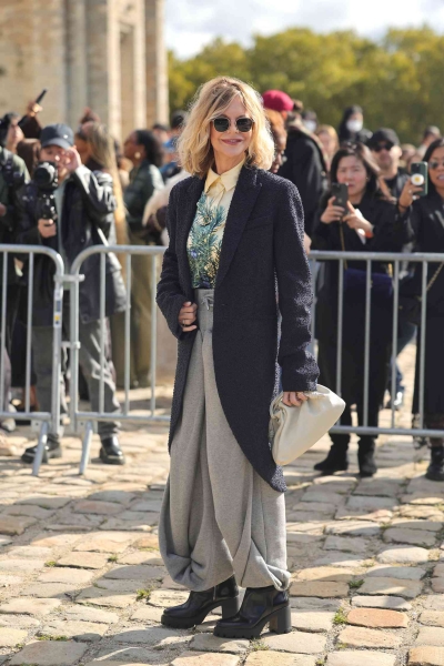 Meg Ryan made an appearance at Loewe's SS25 show at Paris Fashion Week wearing an ultra cozy autumnal look that absolutely screams Meg Ryan Fall.