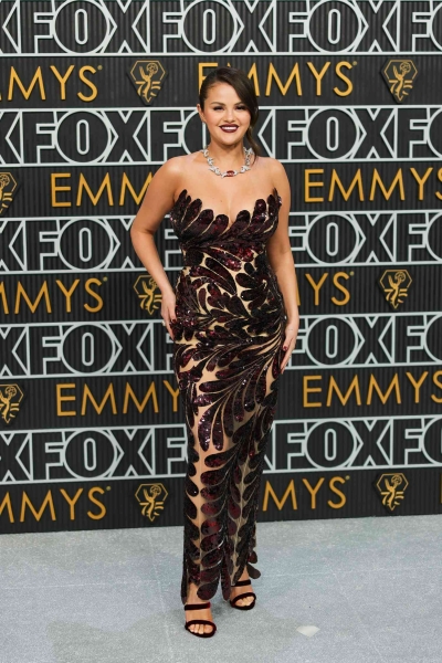 Selena Gomez arrived to the 2024 Emmys wearing a black velvet gown with a crystal-encrusted neckline. See her full look, here.