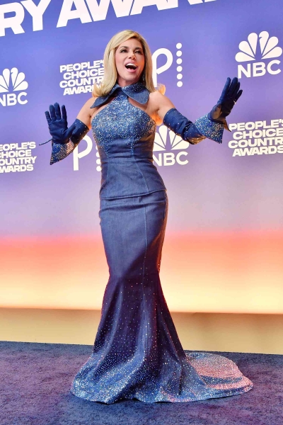 Shania Twain looked like a Barbie doll come to life at the People's Choice Country Awards, wearing a bedazzled demin gown on the red carpet.