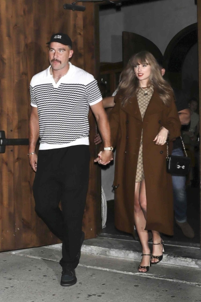 Taylor Swift wore a monogrammed Gucci minidress while stepping out for a double date with her boyfriend Travis Kelce and their friends, Patrick and Brittany Mahomes on Sunday, September 8, in New York City.