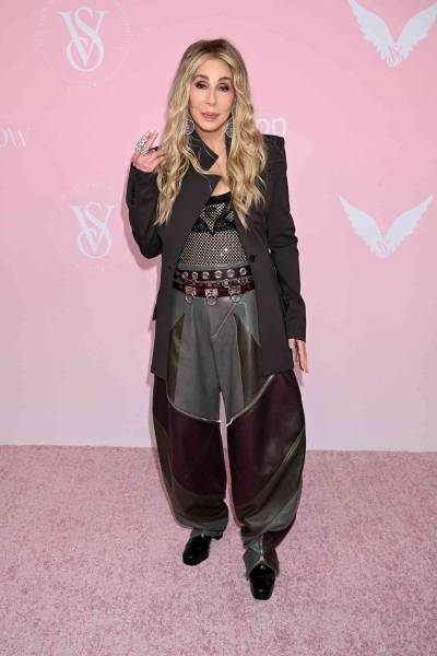 Cher arrived at the 2024 Victoria's Secret Fashion show wearing TKTKKTTK ahead of her performance. See her full look, here.