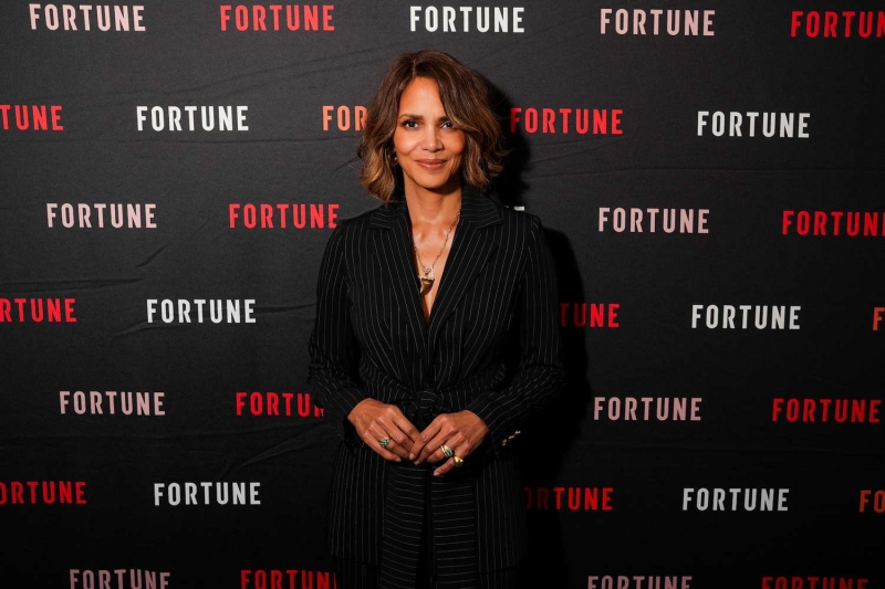 Halle Berry made an appearance at the Fortune Most Powerful Women Summit yesterday wearing a pinstripe suit and a big necklace. See the full look, here.