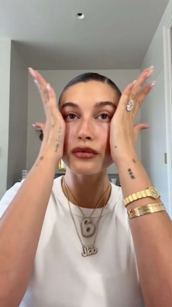 In a new TikTok video, Hailey Bieber showed off a bracelet with the words "Jack Blues." See the new bangle, here.