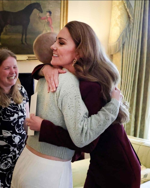 Kate Middleton potentially re-wore a burgundy suit during her first appearance since she finished chemotherapy. See the look, here.