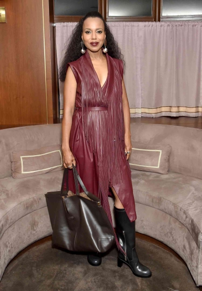 Kerry Washington wore a fringed burgundy dress with a pair of perfect fall boots for a Tod's dinner in Los Angeles. See her full look, including her coordinating lip color, here.