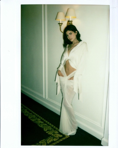 Kylie Jenner wore white after Labor Day in a cut-out shirt and sheer skirt from her fashion brand Khy and its collaboration with Atlein Paris. See her rule-breaking look, here.