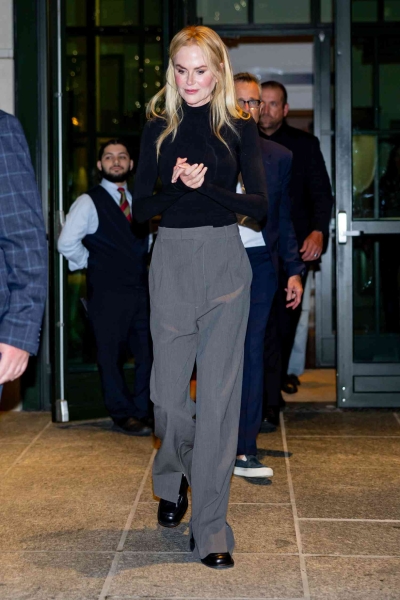 Nicole Kidman wore a black turtleneck with grey trousers while out in New York City on October 5, 2024. See photos of her outfit, here.