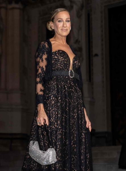 Sarah Jessica Parker appeared at The Golden Heart Awards benefiting God's Love We Deliver at The Cathedral Church of St. John the Divine in New York City wearing a seasonally spooky black lace dress with a plunging neckline.