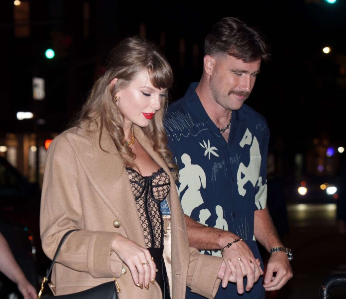 Taylor Swift and her boyfriend Travis Kelce stepped out in New York City for another date night. Swift wore a velvet corset and mini skirt set that nodded to her current 'Tortured Poets Department' style era.