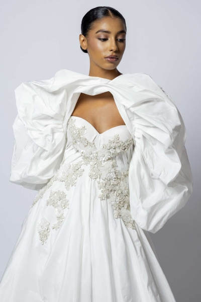 With brides looking beyond the usual white ballgown and weddings involving more events than ever, designers have more room to play. From disco-appropriate frocks to dramatic capes, these are the defining bridal fashion trends for 2025.