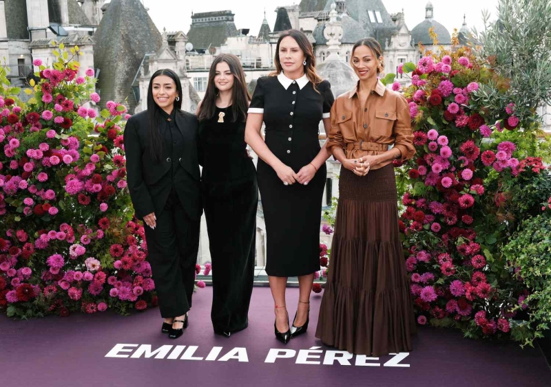 Zoe Saldaña wore a full Saint Laurent look to the 'Emilia Perez' photo call in London that included a fall-ready palette and a skirt with a surprising sheer detail. See her look, here.