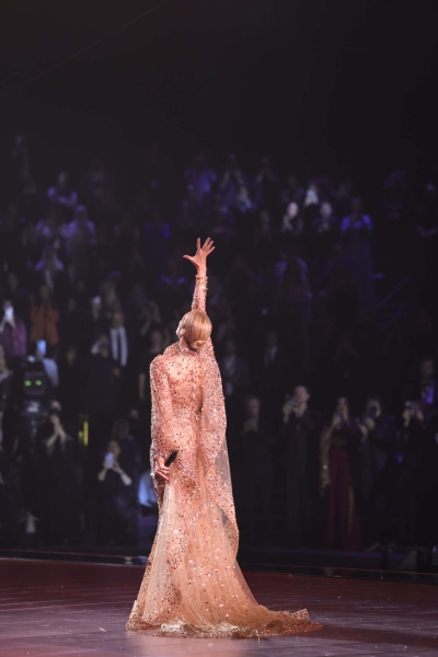 Celine Dion gave a triumphant performance in a dazzling, sequin-covered gown at 1001 Seasons of Elie Saab. See her regal look, here.