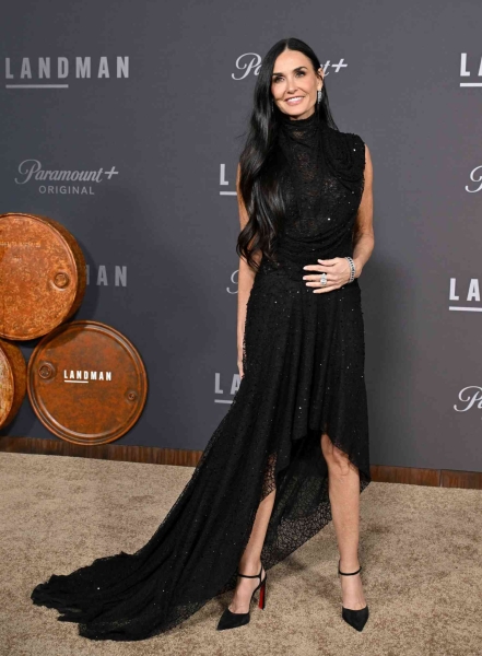 Demi Moore wore a shimmering McQueen gown to the premiere of Paramount+'s 'Landman.' See her full oil-slick inspired look, here.