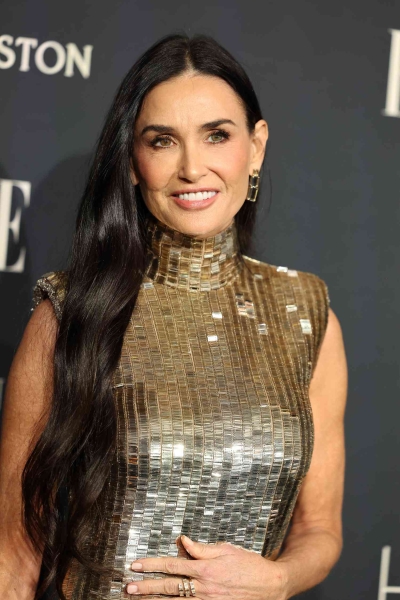 Demi Moore wore a silver sequined gown by Ralph Lauren to the 2024 Elle Women of the Year event. See the outfit here.