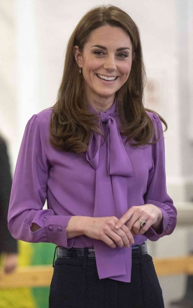 Princess Diana's niece, Lady Amelia Spencer, borrowed one of Kate Middleton's styling tricks by wearing her blouse the wrong way. See her fashion hack, here.