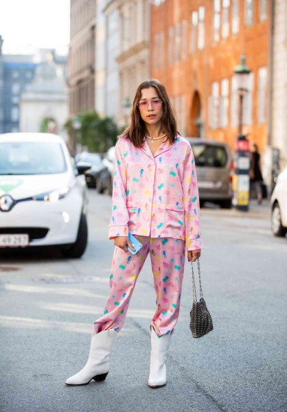 Satin pajama sets have become a street style staple and we've got fresh ways to wear them. Here's how to wear a satin pajama set outside of the house for date night, brunch, and everything in between.