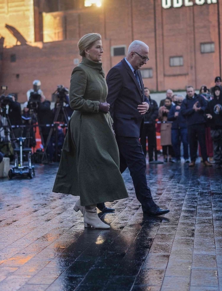 Sophie, Duchess of Edinburgh, wore an olive green coat dress during the Birmingham pub bombing memorial on November 21. The look is reminiscent of one of Kate Middleton's go-to outfit formulas. See photos of the look—and the inspiartion—here.