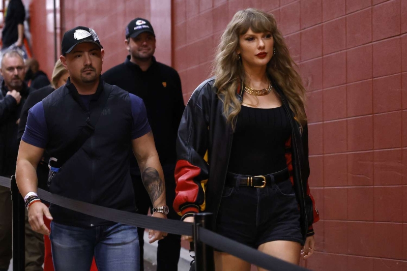 Taylor Swift wore black denim shorts and an oversized jacket to attend the Kansas City Chiefs vs. Tampa Bay Buccaneers game. See the full look, here.