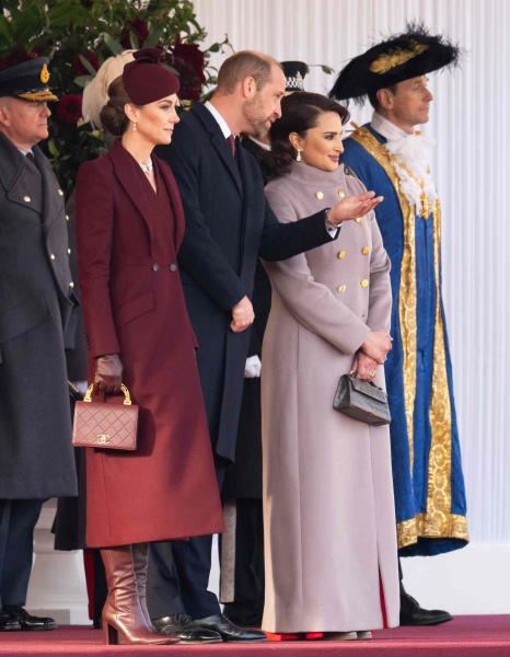 After greeting the Emir of Qatar in a burgundy coat and a pair of knee-high leather boots, the Princess of Wales subtly swapped out her shoes for a pair of stilettos. Here's how she made the switch.