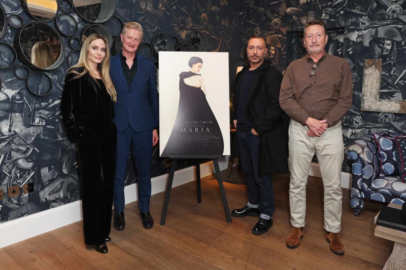 Angelina Jolie attended a recent screening of 'Maria' in London and wore a chic all-black velvet ensemble that is perfect for understated party season inspiration.