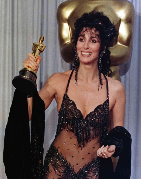 Cher explained her decision behind her wearing an ab-baring look by Bob Mackie to the 1986 Oscars in lieu of a traditional gown. See what she had to say, here.