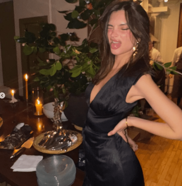 Emily Ratajkowski took to Instagram to share images of her slinky little black dress for a Christmas party.