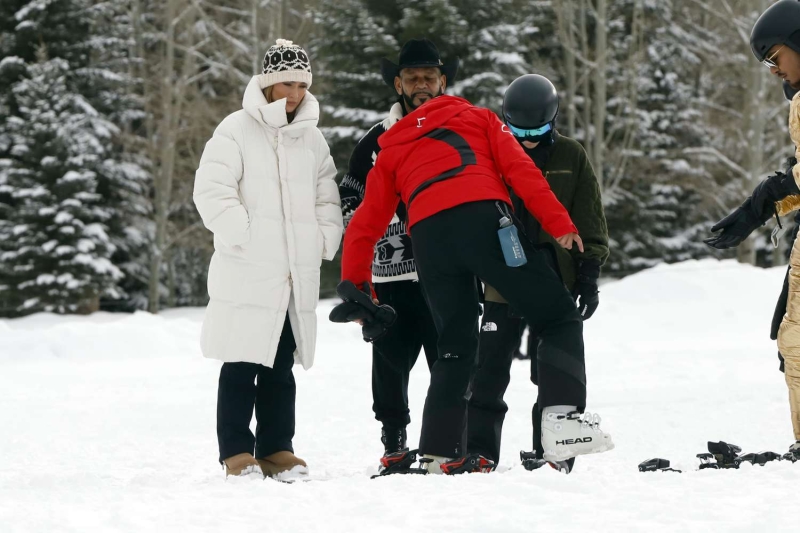 Jennifer Lopez hit the slopes with her friends in Aspen, Colorado, wearing a rule-breaking white puffer coat with a white sweater and Ugg boots. See her full ski-chic look, here.