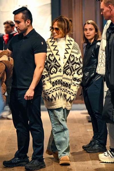 Jennifer Lopez sported a chalet-ready sweater and Uggs look during a Christmas skiing holiday in Aspen.