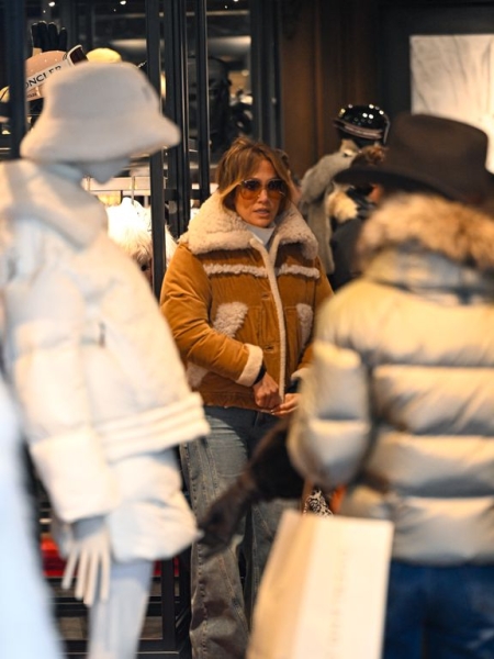 Jennifer Lopez sported a chalet-ready sweater and Uggs look during a Christmas skiing holiday in Aspen.