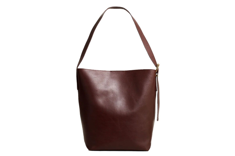 Katie Holmes wore winter’s no. 1 accessory: a practical bucket bag that is spacious, structured, and sleek for everyday use. I found eight lookalikes of her chocolate brown tote at Amazon, Nordstrom, Coach, and more, starting at $33.