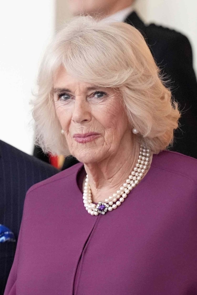 Queen Camilla seemingly sent a secret message about her health amid her ongoing pneumonia battle with her amethyst-and-pearl necklace. She wore the meaningful jewelry piece while bidding farewell to the Qatari royals on Wednesday, December 4.