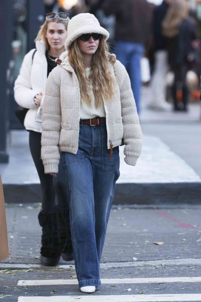 Sydney Sweeney channeled Rihanna in a sheer lace bustier and triple leather for a rare date night with her fiancé Jonathan Davino in New York City. See her full look, here.