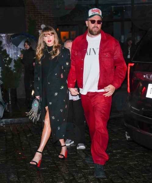 Taylor Swift wore a embellished winter coat by Simkhai with a mini dress by Fleur Du Mal, and she paired the outfit with Christian Louboutin heels and $36,000 De Beers earrings.