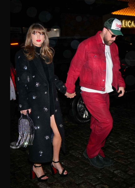 Taylor Swift wore a embellished winter coat by Simkhai with a mini dress by Fleur Du Mal, and she paired the outfit with Christian Louboutin heels and $36,000 De Beers earrings.