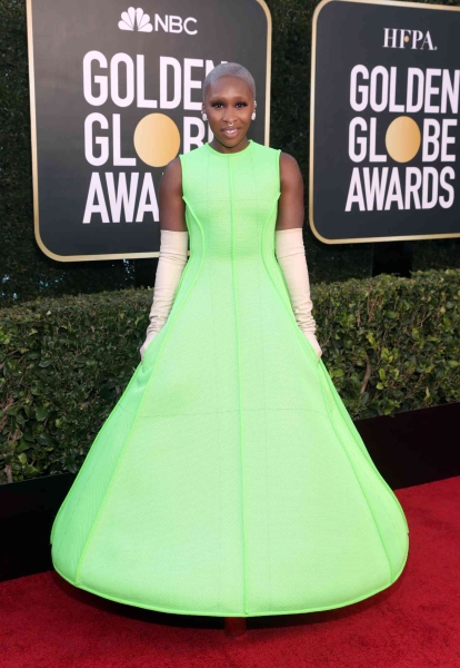 Cynthia Erivo attended the 2025 Golden Globes in a plunging black-and-silver peplum gown. See Erivo's 2025 Golden Globes outfit here.