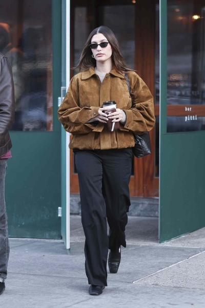 Hailey Bieber stepped out in Soho wearing an effortless cool girl look featuring one of the biggest jacket trends of the season.