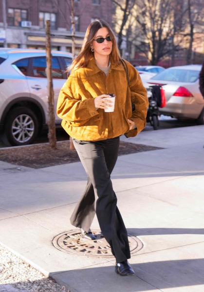 Hailey Bieber stepped out in Soho wearing an effortless cool girl look featuring one of the biggest jacket trends of the season.