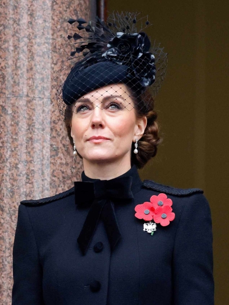 Kate Middleton wore Queen Elizabeth's statement pearl earrings and five-string pearl necklace from a Jewish-owned vintage store with a meaningful message to her last-minute Holocaust Memorial appearance on January 27 alongside Prince William. Here's the hidden meaning behind her jewelry and outfit.